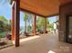 Spacious outdoor porch overlooking a lake with elegant wooden support beams at 111 Milledge Dr, Mooresville, NC 28117
