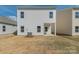 A spacious backyard, perfect for outdoor activities, attached to a home with light-colored siding at 1121 Red River Dr, Salisbury, NC 28144