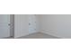 Bright bedroom with fresh paint, neutral carpet, and multiple doorways, ready for personalization at 1121 Red River Dr, Salisbury, NC 28144