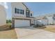 Charming two-story home with two-car garage, brick accents, and a well-maintained lawn at 1121 Red River Dr, Salisbury, NC 28144