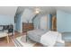 Cozy bedroom with wood floors, sloped ceilings, neutral walls and ceiling fan, offering a peaceful retreat at 114 Rolling Stone Ct, Mooresville, NC 28117