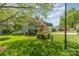 Well-maintained front yard with a two-story home, lush grass, and attractive landscaping at 114 Rolling Stone Ct, Mooresville, NC 28117