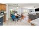 Open kitchen and breakfast nook area features stainless appliances and ample natural light at 114 Rolling Stone Ct, Mooresville, NC 28117