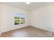 This bedroom is bright and spacious with pastoral views through a large picture window at 120 Southern Oaks Ln, Salisbury, NC 28147