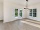 Bright dining room with french doors that lead to the backyard area at 120 Southern Oaks Ln, Salisbury, NC 28147