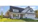 Charming exterior elevation with manicured lawn, showcasing a modern design at 120 Southern Oaks Ln, Salisbury, NC 28147