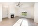 The living room features a cozy fireplace, and natural light from the picture window at 120 Southern Oaks Ln, Salisbury, NC 28147