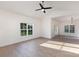 Spacious living room with vaulted ceilings and hardwood floors that flow into the dining area at 120 Southern Oaks Ln, Salisbury, NC 28147