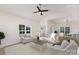 Bright and airy living room with hardwood floors, ceiling fan, and three piece sofa set at 120 Southern Oaks Ln, Salisbury, NC 28147