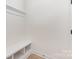 Mud room featuring a white bench with open shelving and neutral paint at 120 Southern Oaks Ln, Salisbury, NC 28147