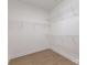 Walk-in closet featuring wood-look flooring and wire shelving at 120 Southern Oaks Ln, Salisbury, NC 28147