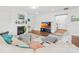 Bright and spacious living room featuring hardwood floors, a fireplace, and comfortable seating at 12305 Stinson Ct, Charlotte, NC 28277