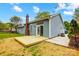 Backyard featuring new wood deck, blue siding, brick chimney at 13417 Krislyn Woods Pl, Charlotte, NC 28278