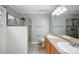 This bathroom is complete with double sinks and a glass enclosed shower at 13417 Krislyn Woods Pl, Charlotte, NC 28278