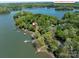 Aerial view of a wooded lakeside lot at 1395 Roundstone Rd, Sherrills Ford, NC 28673