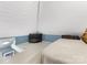 Upstairs attic area with painted wooden walls and floors, with access to a lower level at 1395 Roundstone Rd, Sherrills Ford, NC 28673