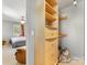 Bedroom closet with open storage and a view into the bedroom space at 1395 Roundstone Rd, Sherrills Ford, NC 28673