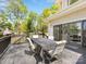 Inviting backyard deck with a lake view, and outdoor dining area at 1395 Roundstone Rd, Sherrills Ford, NC 28673