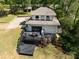 Aerial view of a lovely home featuring a spacious deck and outdoor dining area at 1395 Roundstone Rd, Sherrills Ford, NC 28673
