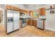 Modern kitchen with stainless steel appliances, wood cabinets, and plenty of counter space at 1395 Roundstone Rd, Sherrills Ford, NC 28673