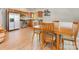 Open concept kitchen features stainless steel appliances and light wood floors at 1395 Roundstone Rd, Sherrills Ford, NC 28673
