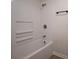 Bathroom featuring tiled shower and tub combo with chrome fixtures at 1663 Smyre Farm Rd # 5, Newton, NC 28658