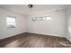 Spacious room with wood floors and natural light, perfect for relaxation at 1663 Smyre Farm Rd # 5, Newton, NC 28658