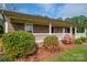 Charming brick home with a covered front porch and colorful landscaping at 1663 Smyre Farm Rd # 5, Newton, NC 28658