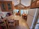 Efficient kitchen features ample wood cabinetry, countertops, modern appliances, and adjacent dining area at 171 Grand View Dr, New London, NC 28127