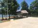 Lakeside park with a covered pavilion and playground, perfect for families at 171 Grand View Dr, New London, NC 28127