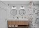 Stylish bathroom with double vanity, marble countertops, modern fixtures, and decorative mirrors at 181 Glynwater Dr, Mooresville, NC 28117