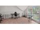 Bonus room boasts natural light, ample space, and wood flooring at 181 Glynwater Dr, Mooresville, NC 28117