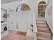 Bright entryway with hardwood floors, arched window above the front door, and staircase leading to upper level at 181 Glynwater Dr, Mooresville, NC 28117