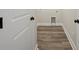 Clean laundry room with wood-look flooring and a dryer vent at 203 E 27Th St, Kannapolis, NC 28083