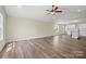 Open-concept living space features sleek flooring, ample natural light, and flows seamlessly into the modern kitchen at 203 E 27Th St, Kannapolis, NC 28083