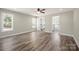 Spacious main bedroom offers a walk-in closet and an en-suite bathroom for added privacy and convenience at 203 E 27Th St, Kannapolis, NC 28083