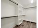 Large walk-in closet with custom shelving and ample storage space, ready to organize your wardrobe at 203 E 27Th St, Kannapolis, NC 28083