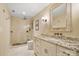 Elegant bathroom with a walk-in shower, granite countertops, and rustic mirror at 20428 Island Forest Dr, Cornelius, NC 28031