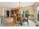 Dining area with a chandelier, wine display and view of the backyard at 20428 Island Forest Dr, Cornelius, NC 28031
