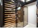 Glass door wine cooler with shelving, interior lighting, and temperature controls at 20428 Island Forest Dr, Cornelius, NC 28031