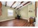 Bedroom featuring hardwood floors, a ceiling fan, and a black chair at 2239 Wensley Dr, Charlotte, NC 28210