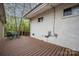 Exterior wooden deck with string lights and outdoor dining area at 2239 Wensley Dr, Charlotte, NC 28210