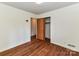 Bedroom with hardwood floors and closet at 225 Enwood Dr, Charlotte, NC 28214