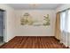 Light-filled dining room showcases hardwood floors and decorative wall art at 225 Enwood Dr, Charlotte, NC 28214