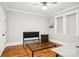 Bedroom with wood floors and a black bed frame with a nightstand at 2315 Dundeen St, Charlotte, NC 28216