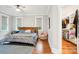 Bedroom with hardwood floors and walk-in closet at 2315 Dundeen St, Charlotte, NC 28216