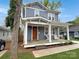 Attractive two-story house with a cozy front porch and well-maintained landscaping at 2315 Dundeen St, Charlotte, NC 28216
