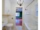 Bathroom showing a view into a bedroom with green walls and hardwood floors at 2326 Armstrong Cir, Gastonia, NC 28054