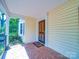Charming covered porch with brick flooring, providing a cozy and inviting entryway at 2326 Armstrong Cir, Gastonia, NC 28054