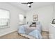 Inviting bedroom with plush carpet, soft lighting, and a comfortable bed creates a relaxing retreat at 2425 Orofino Ct, Charlotte, NC 28269